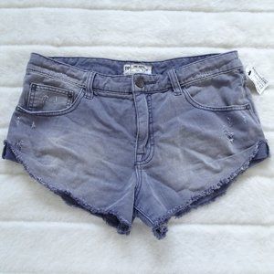 Free People Distressed Jean Shorts in Washed Blue